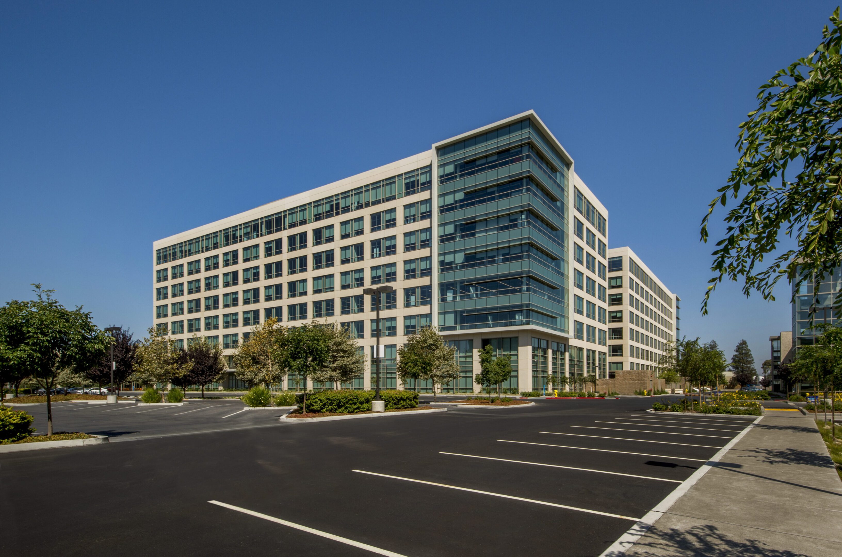 Large office building, daytime.